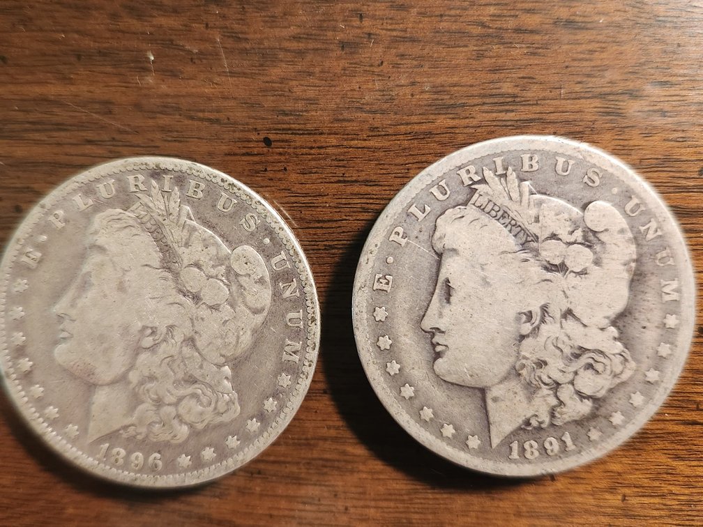 (2) Morgan Silver Dollars, Dated 1891 and 1896