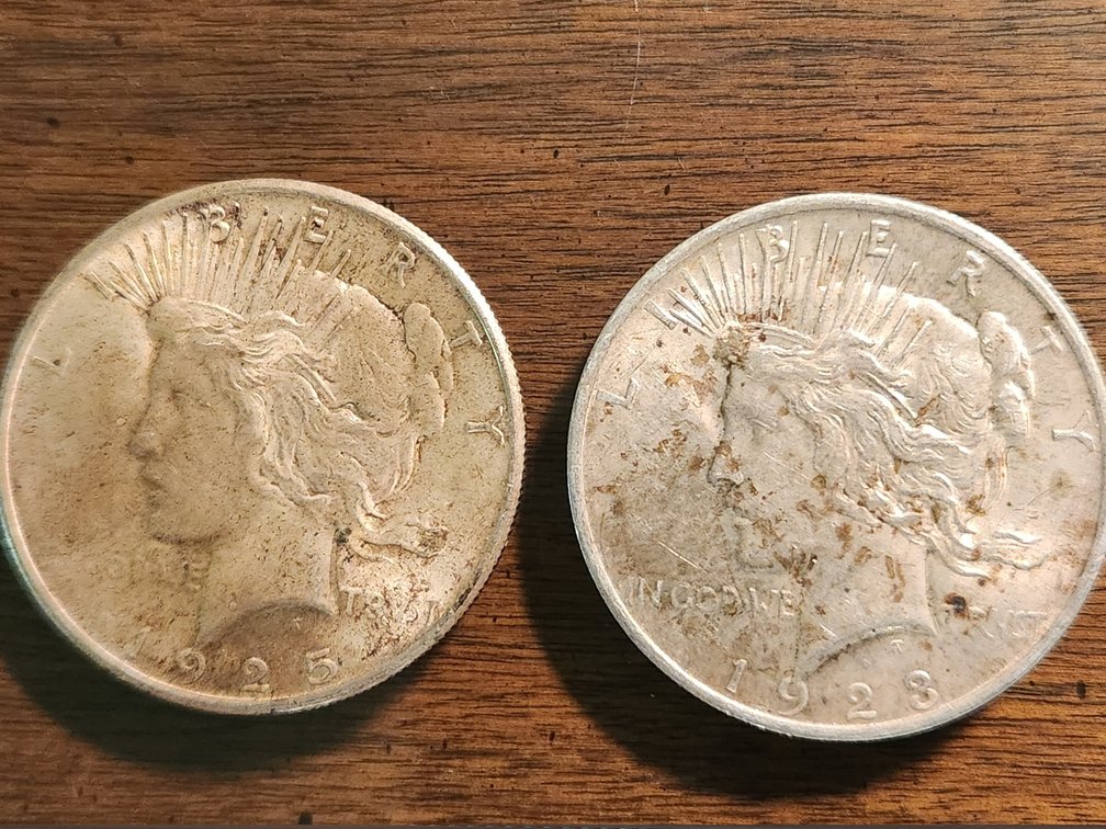 (2) Peace Silver Dollars, Dated 1923 and 1925