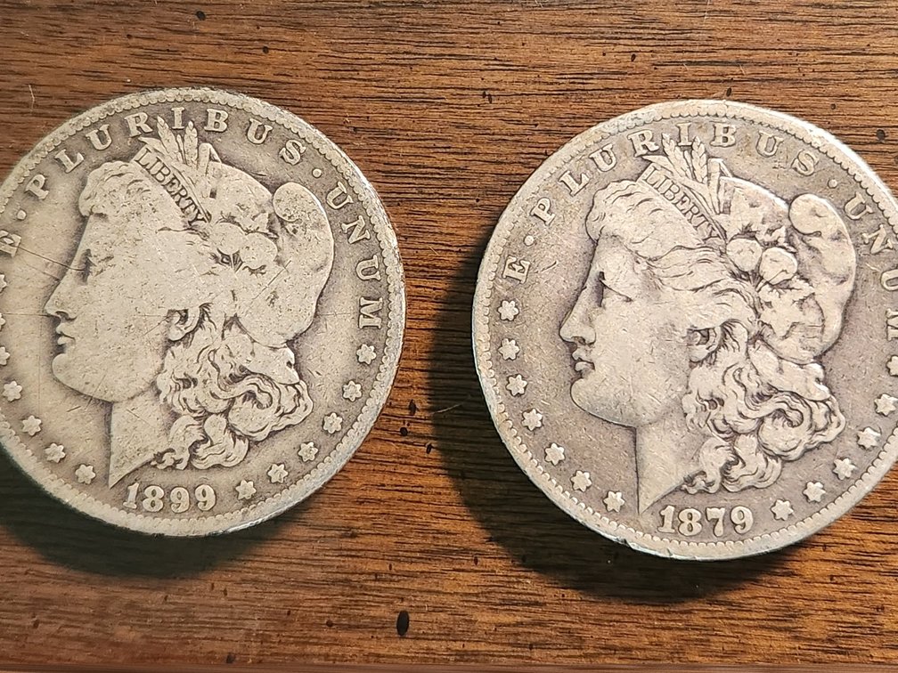 (2) Morgan Silver Dollars, Dated 1879 and 1899
