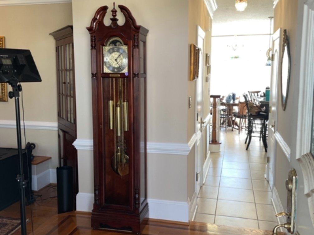 Howard Miller tall case clock; 18” x 10” x 84” tall 