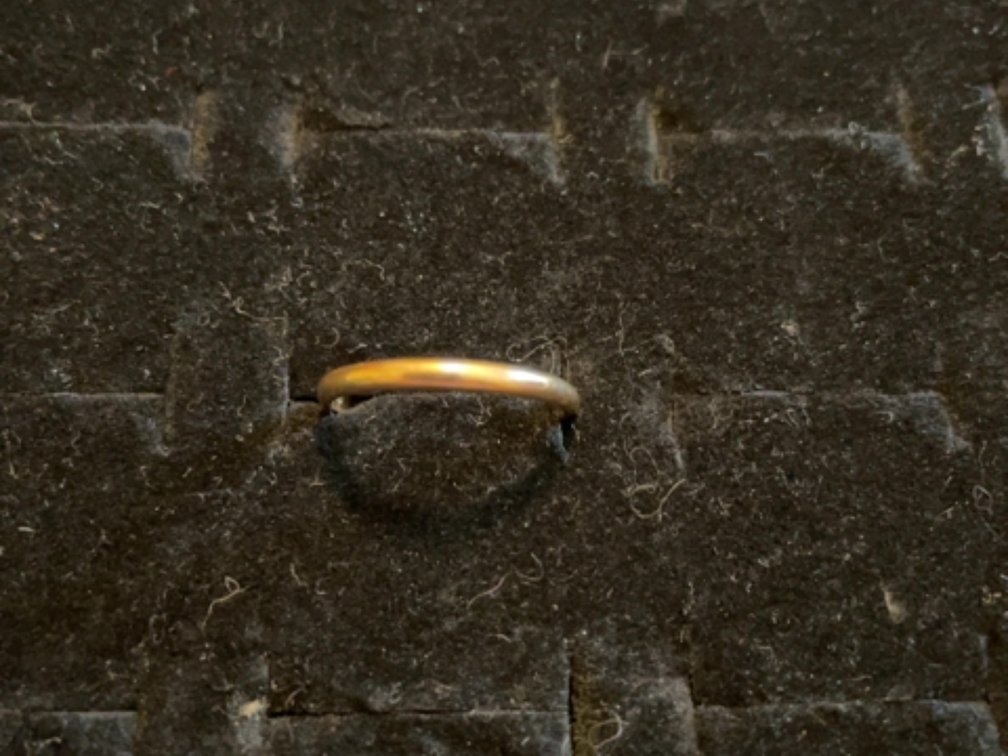 Thin 14kt yellow gold band; 1.4g; size 6.5