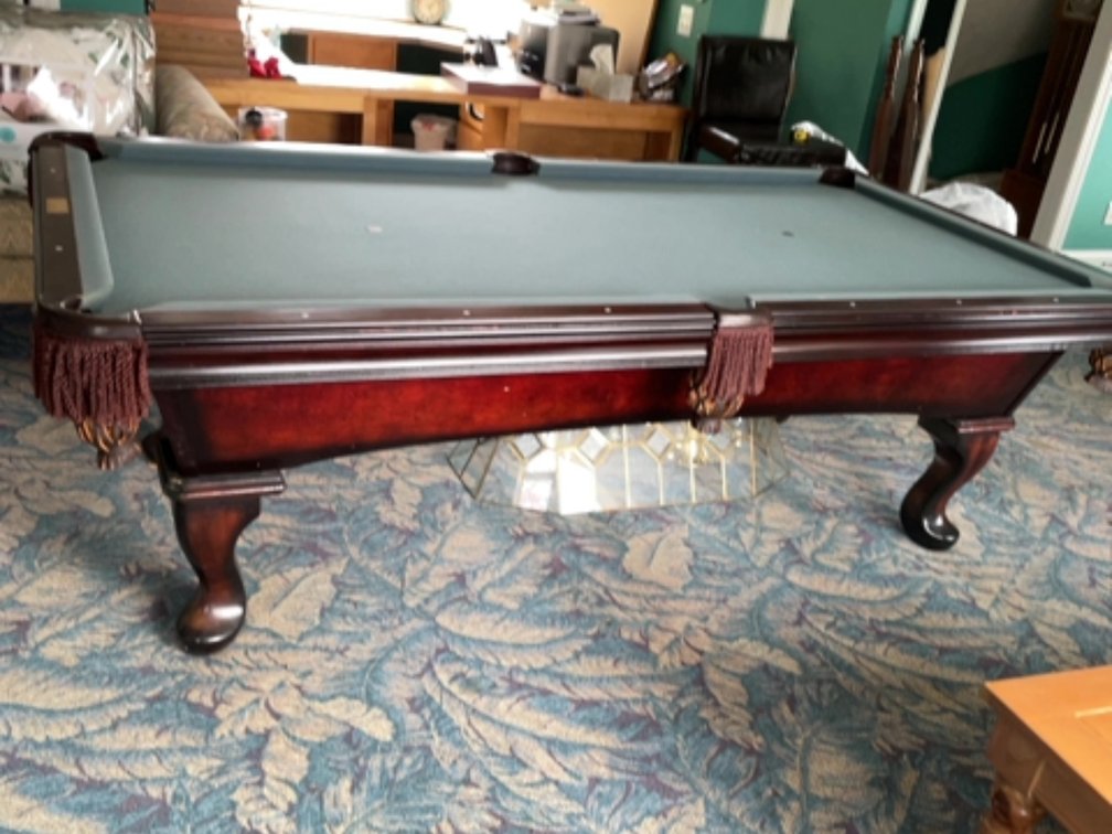 Billiard table by Olhausen; mahogany with Queen Anne feet