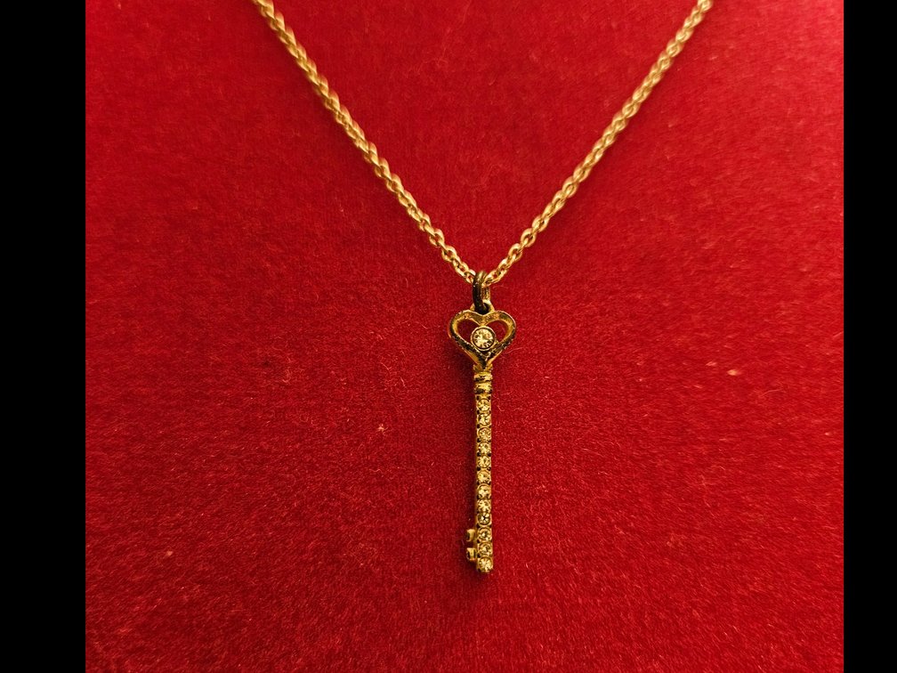 Silver Necklace with Key Pendant with Diamond-like Stones 