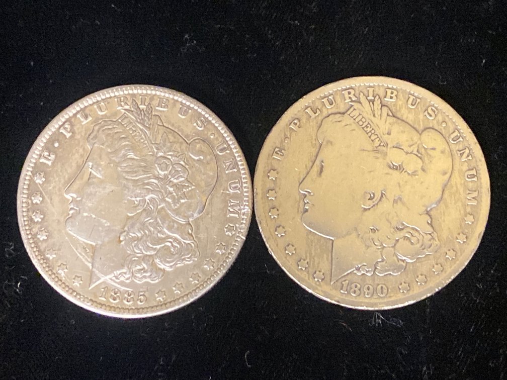 (2) Morgan Silver Dollars