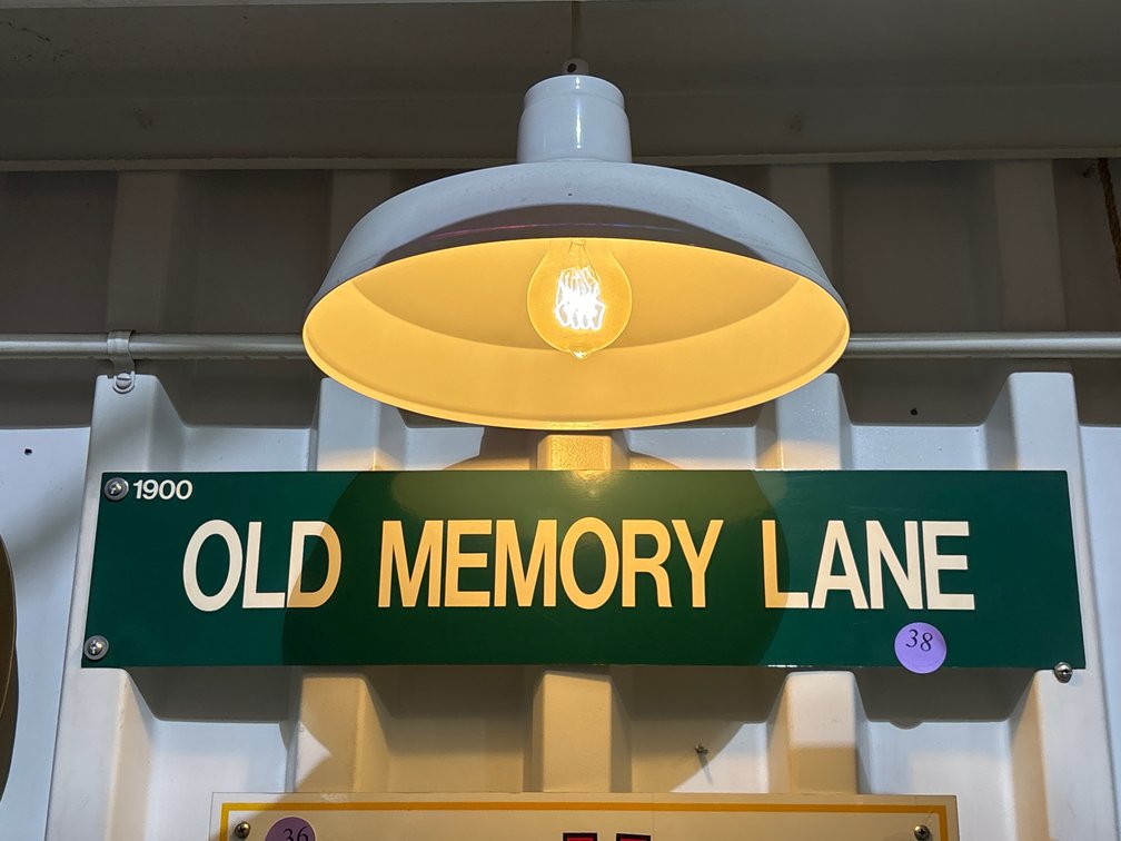 Metal sign, “Old Memory Lane”; 25” x 5”
