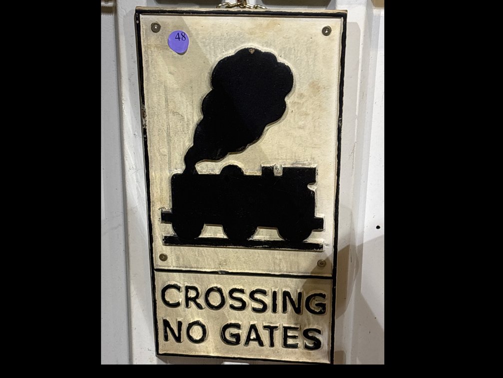 Cast iron “Crossing No Gate” railroad sign