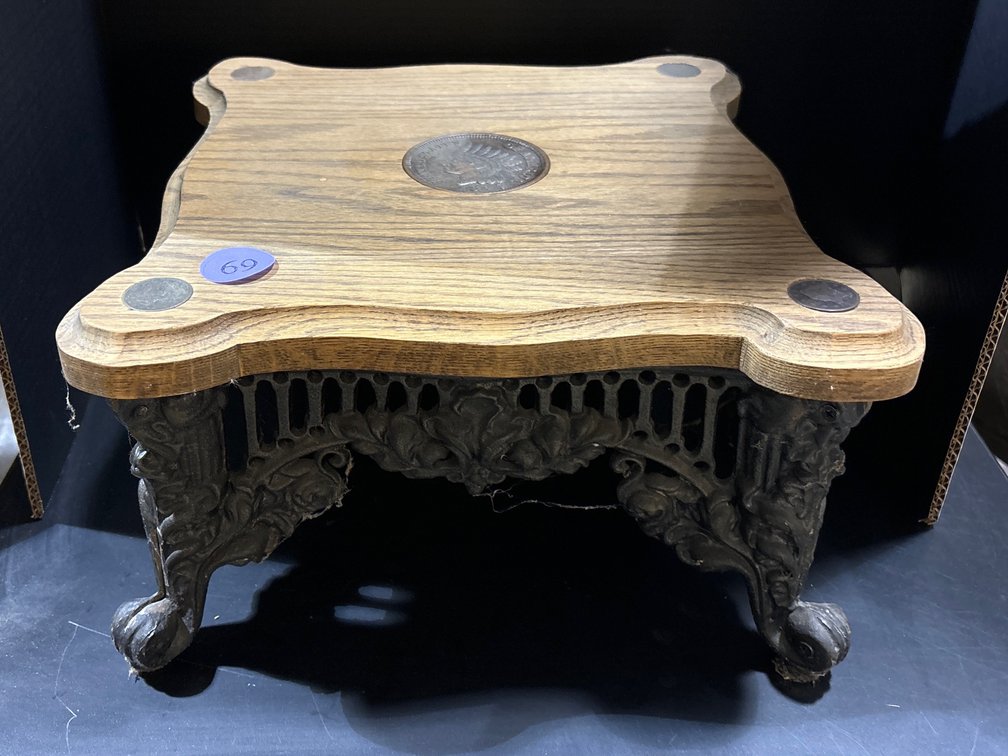 Oak and cast iron stool, embedded w/ coins