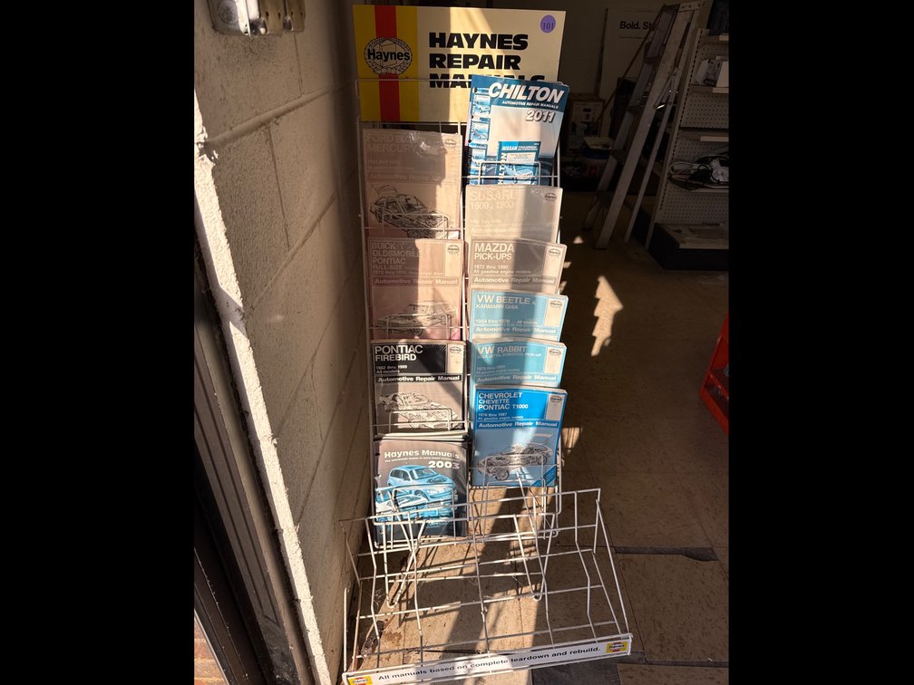 Haynes Repair Manuals (new) and Display Rack