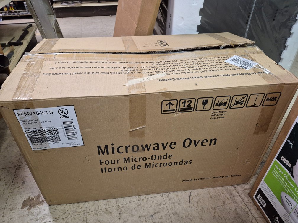 NIB Frigidaire microwave oven