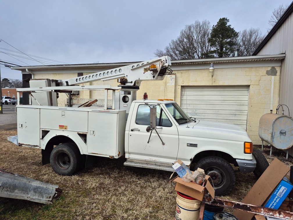 1990 Ford F-450 Super Duty Bucket Truck with generator in bed of truck