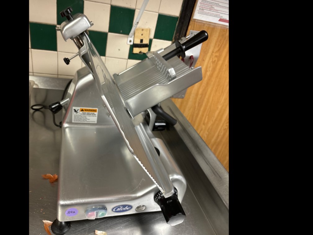 Globe stainless commercial meat slicer