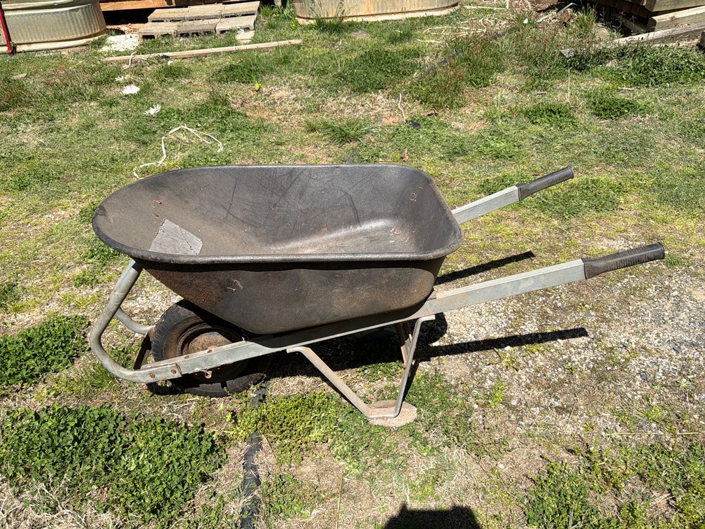 Wheel barrel and small 10 cu ft. pull behind farm cart lot