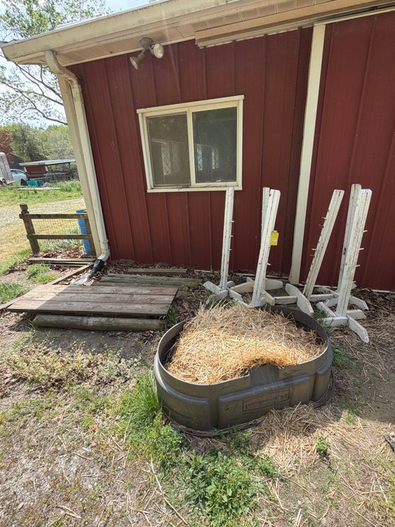Miscellaneous wood post/pile, 3 sets of wooden horse jump stands, small water stock tank