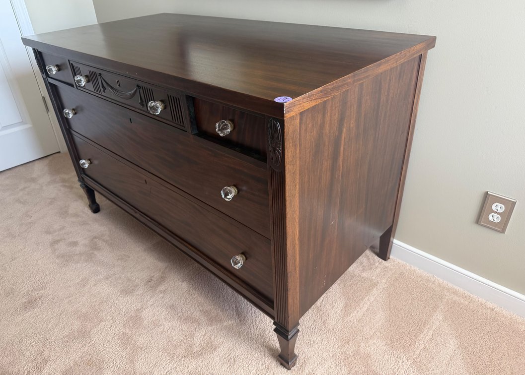 A vintage mahogany wood chest of drawers/dresser