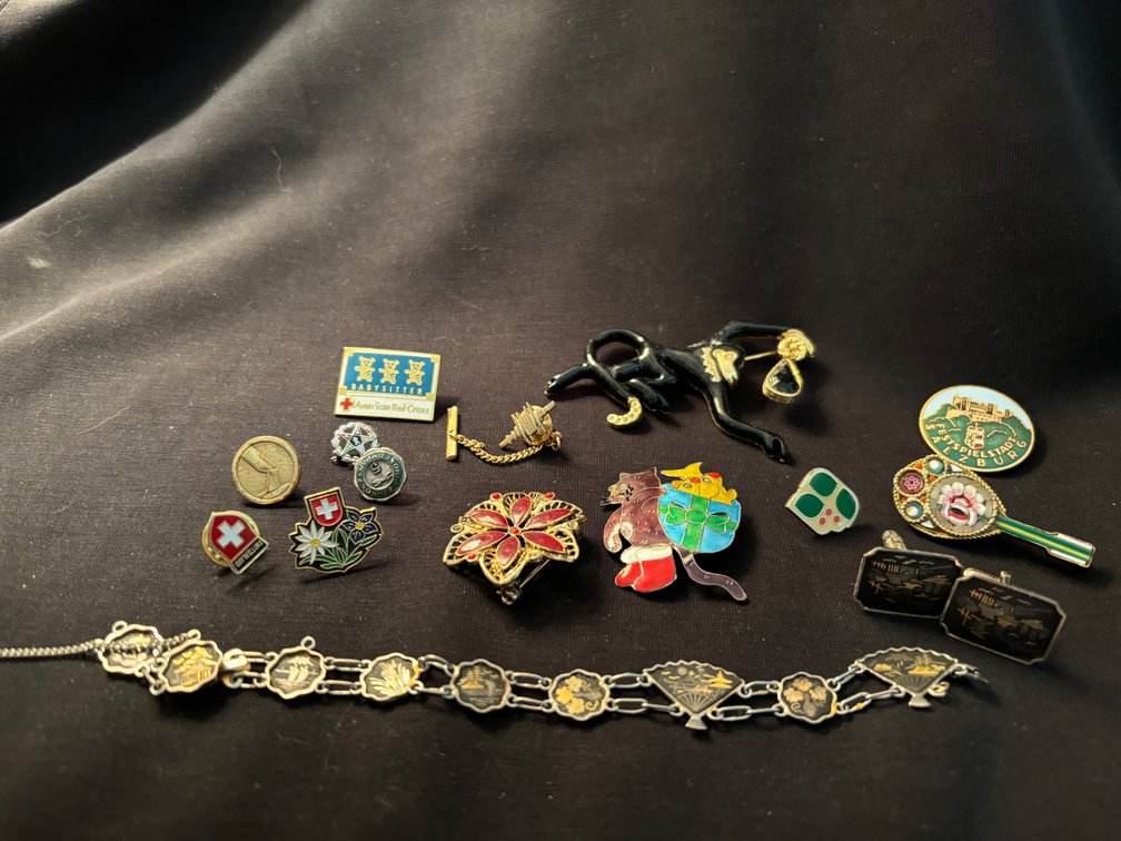 Collection of brooches, pins , etc