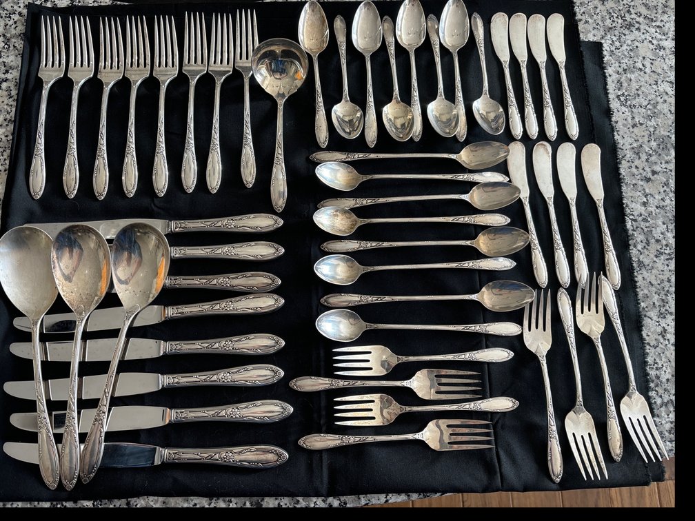 52 pc set of Heirloom Sterling flatware; “Virginian” pattern