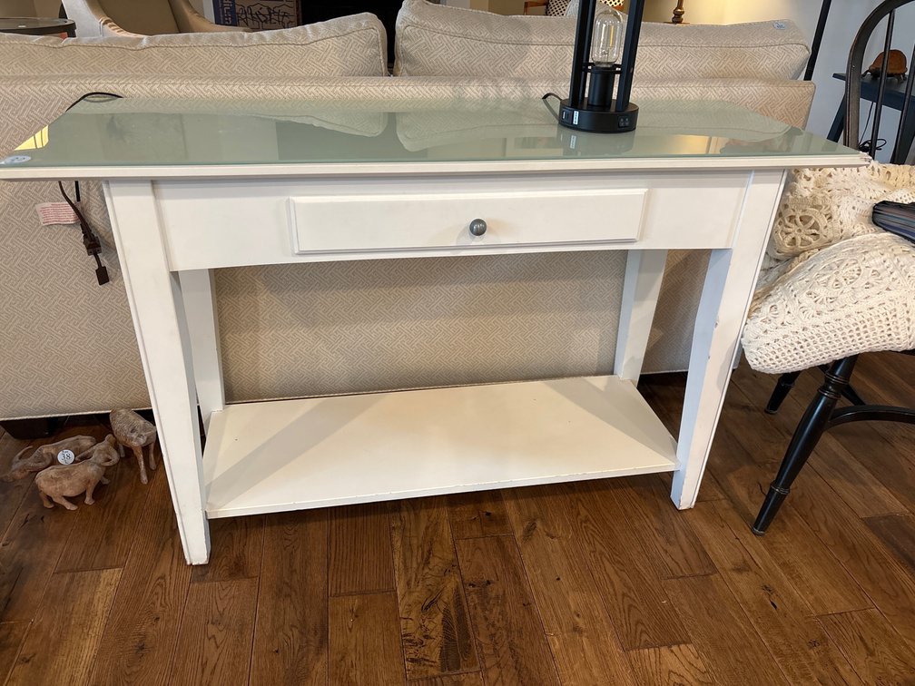 White wooden console table with glass cover, one drawer