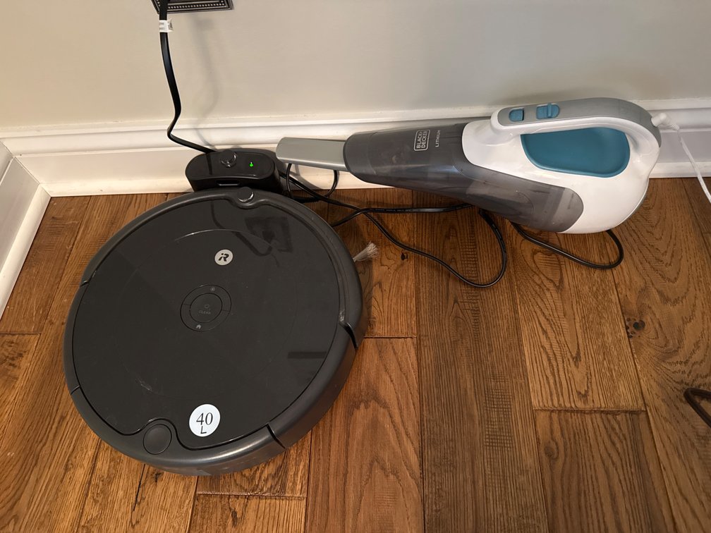 Roomba Vacuum and Black and Decker Hand Vacuum