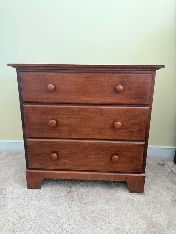 Vintage three-drawer shaker-style dresser made by Moosehead manufacturing company with small lamp