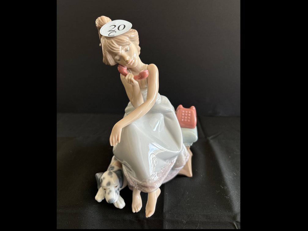 Lladro porcelain girl on phone with dog; 7.5” tall