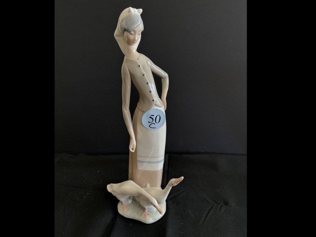 Lladro porcelain girl with geese; 11” tall