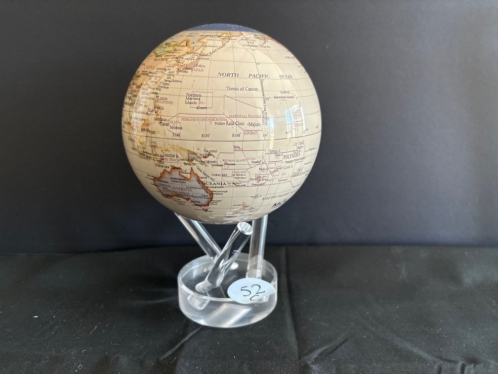 Smithsonian MOVA globe; revolves using ambient light