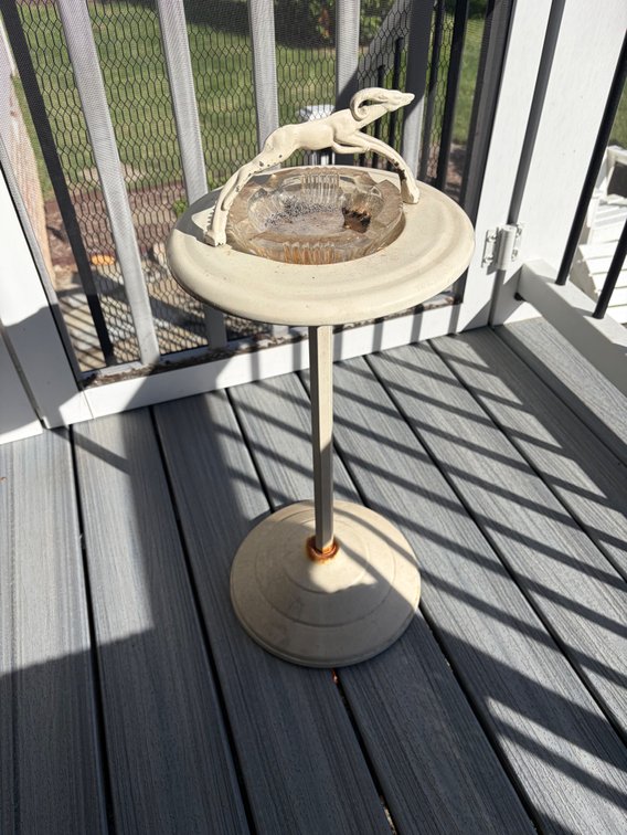 A vintage Art Deco-style standing ashtray