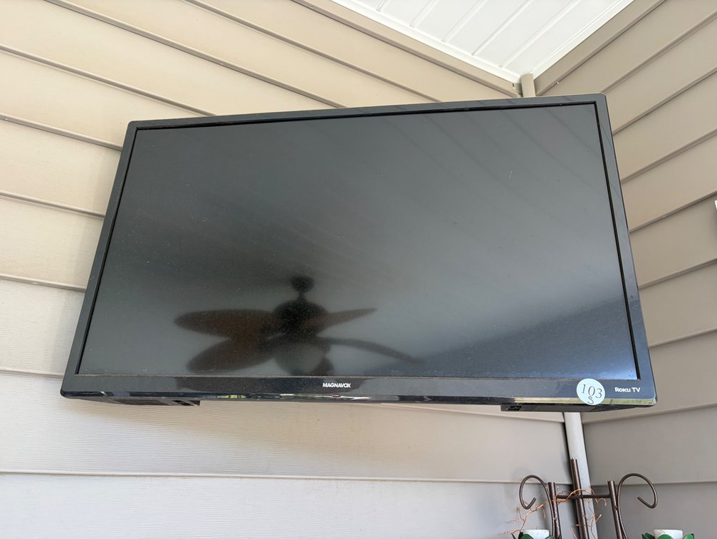 Roku hanging TV with remote