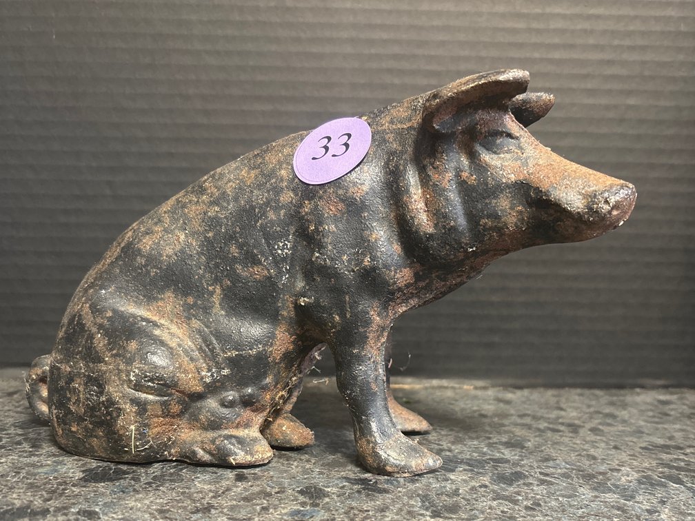 Cast iron pig bank; 9” long