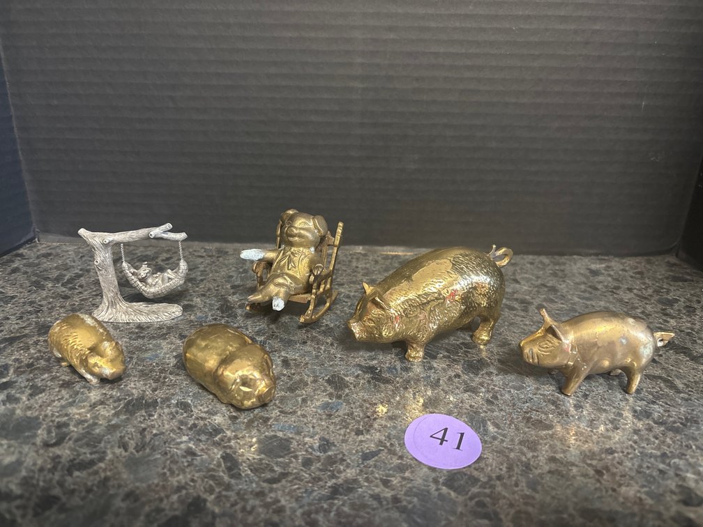 6 small pigs, 5 brass and 1 pewter; largest is 4” long