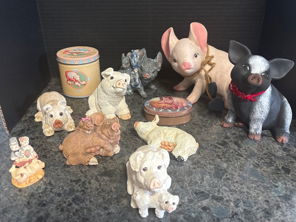 Collection of pigs, mostly composite or ceramic