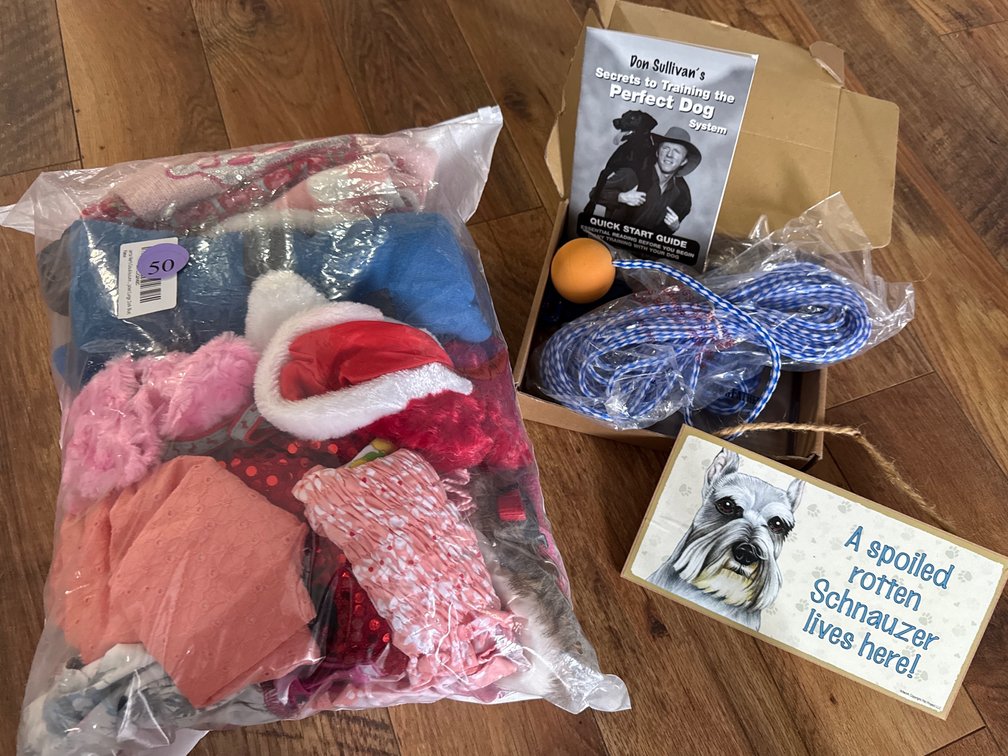 Assorted Sized Dog Clothes, Training Items and Sign