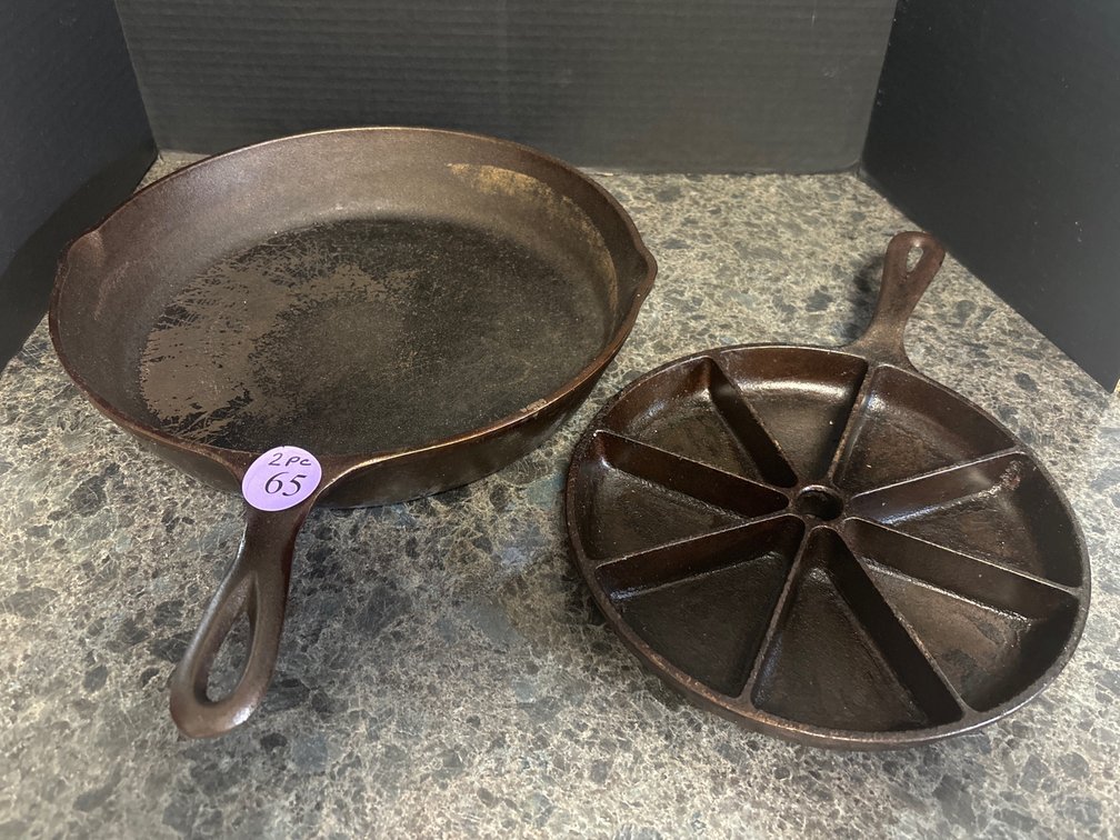 2 cast iron skillets, larger is 12”; by Cracker Barrel