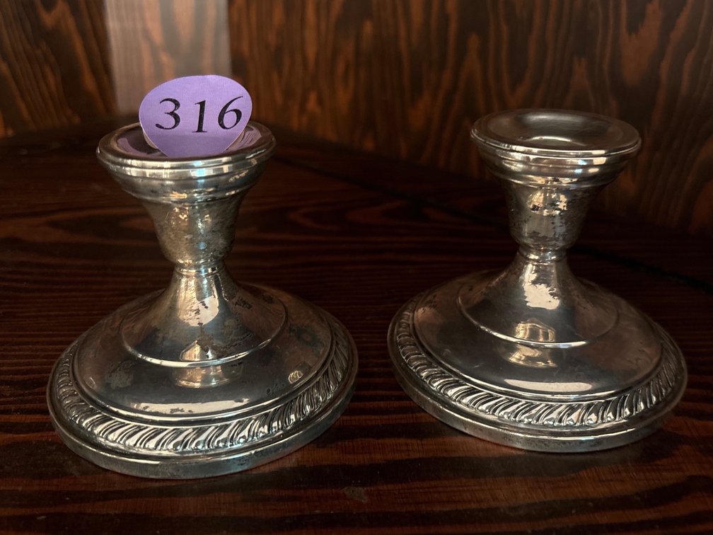 Pair of sterling weighted candle holders; 3” tall