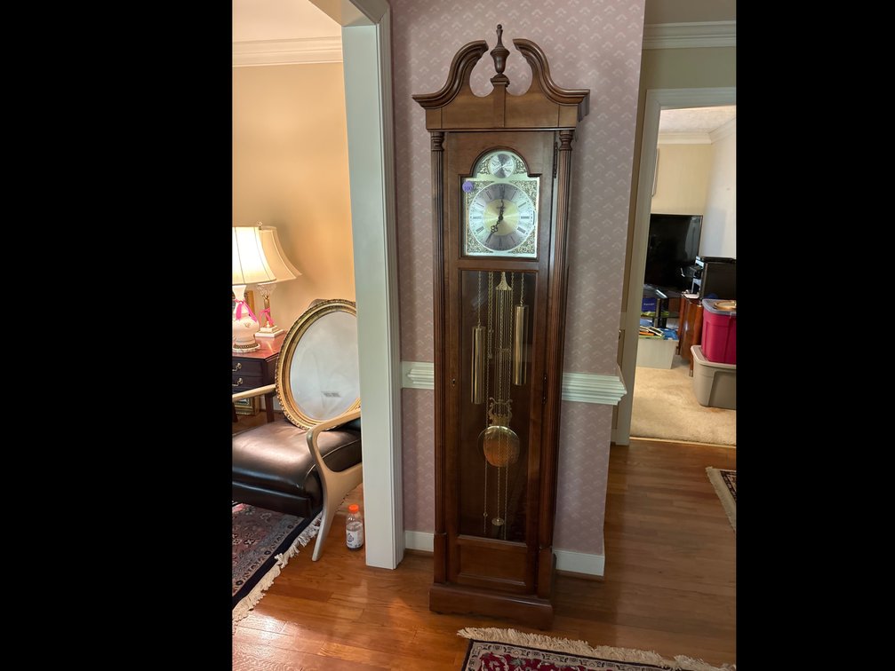 Howard Miller tall case clock; weight driven; 17” x 10” x 79” tall