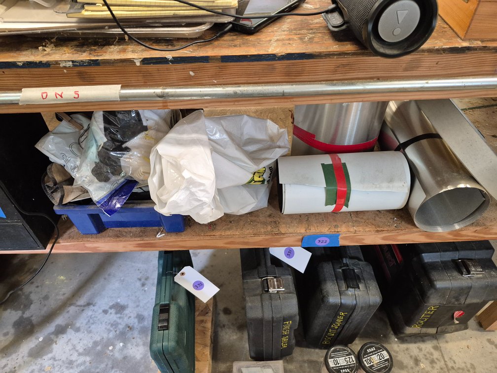 Items on work bench shelf