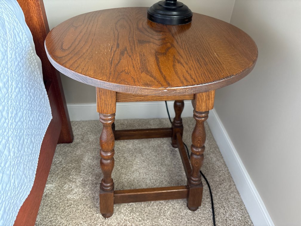 Round oak side tables; 20” x 23” tall