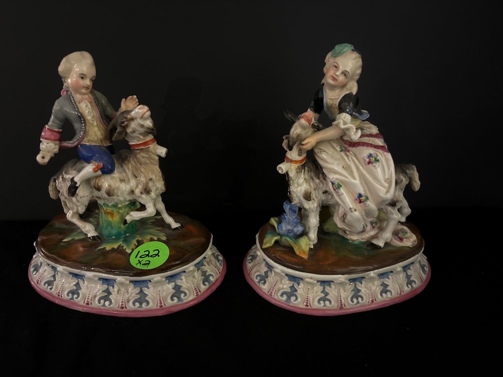 Staffordshire figures; man, woman w/ goats