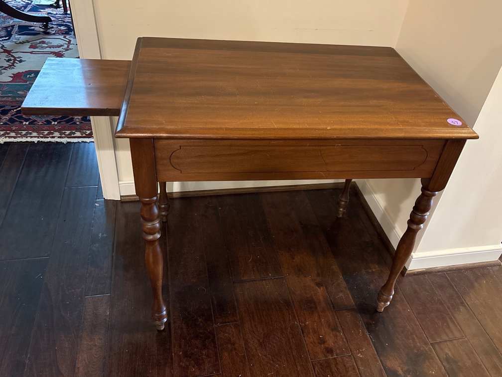 Wooden tea table with slide out tray