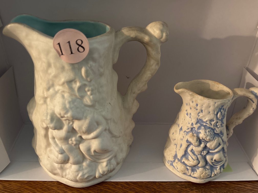 2 parian ware pitchers; taller is 7”