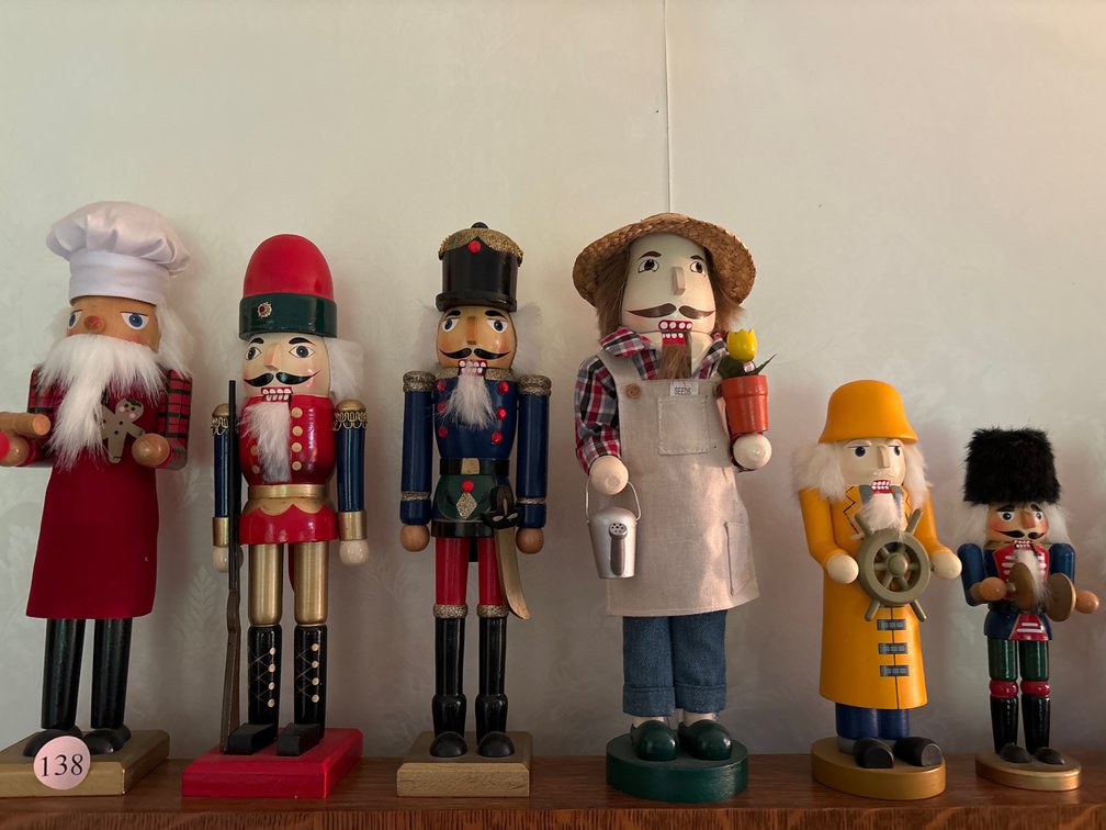 11 wooden nutcrackers; tallest are 13”