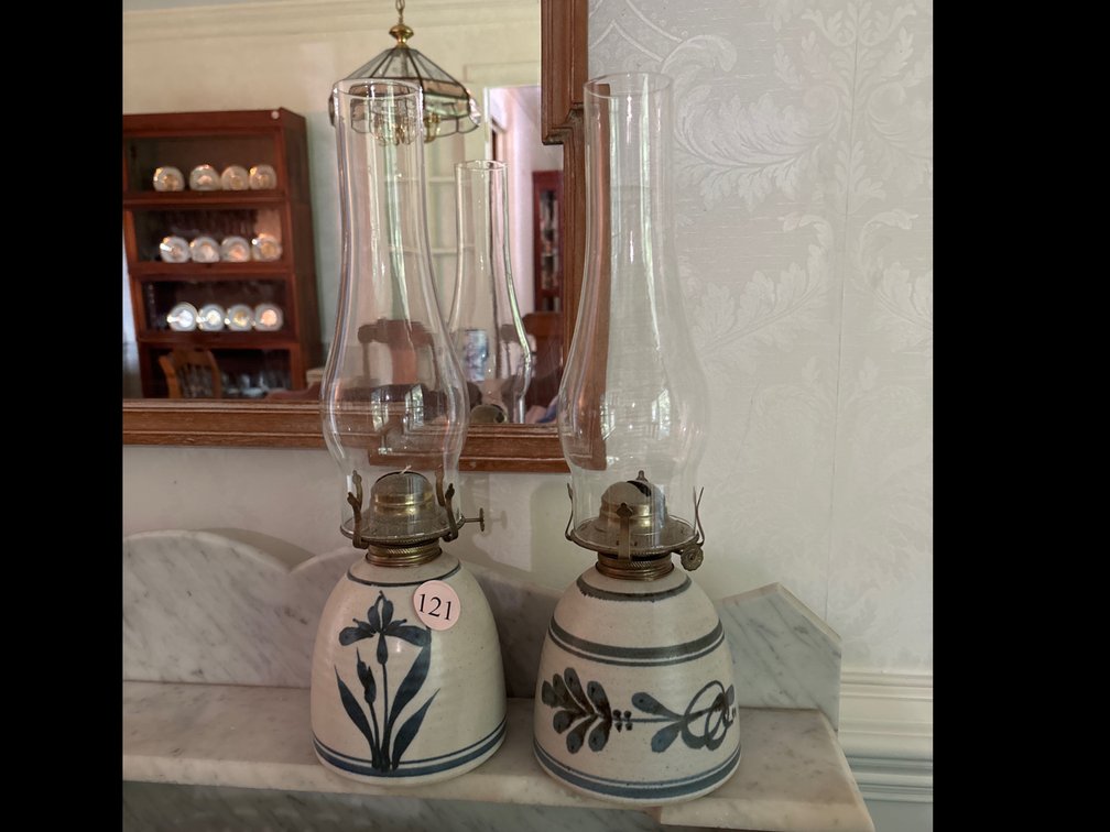 2 pottery oil lamps; 16” tall