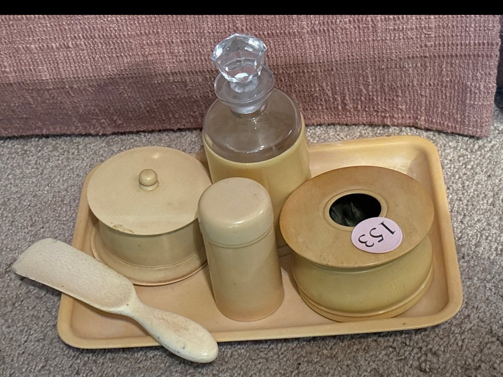 Vintage celluloid dresser items: tray, bottle, etc