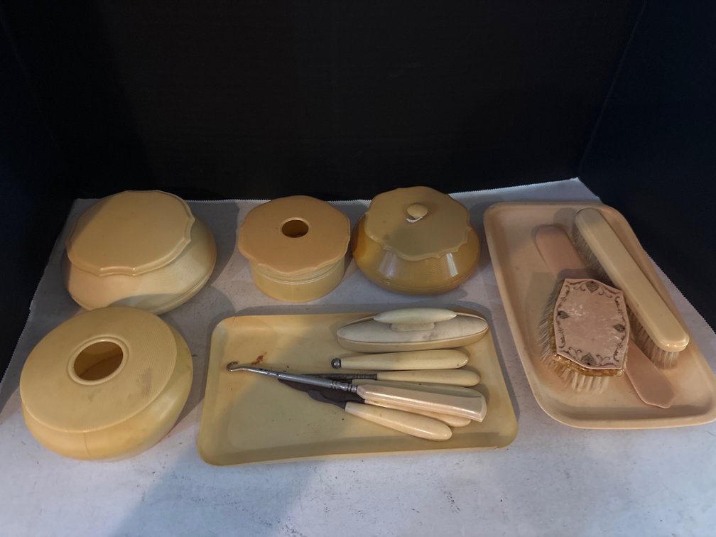 Vintage celluloid dresser items: trays, boxes, etc