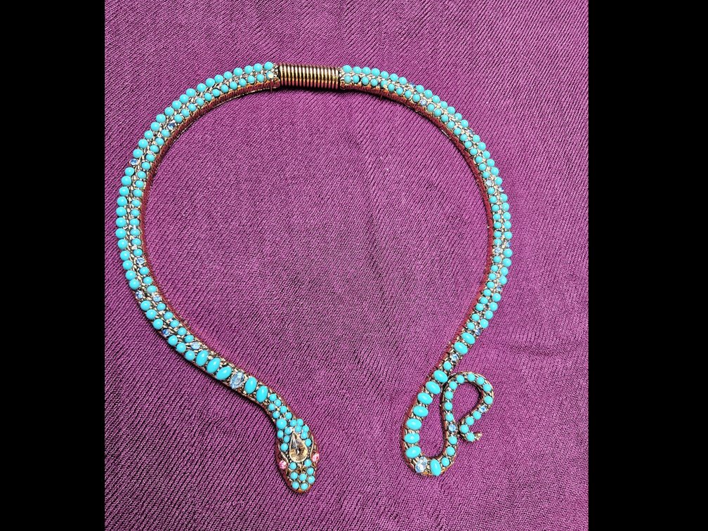 Metal Snake form Necklace set with Turquoise colored Stones 