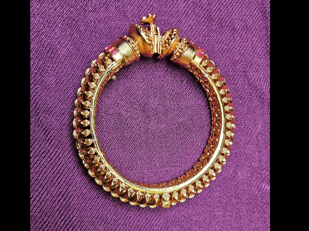 Yellow Gold colored Ornate Bracelet 