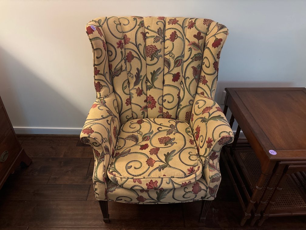 Wing chairs; crewel work printed upholstery