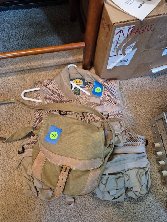 Cabela's fishing vest, L.L. Bean gear bag