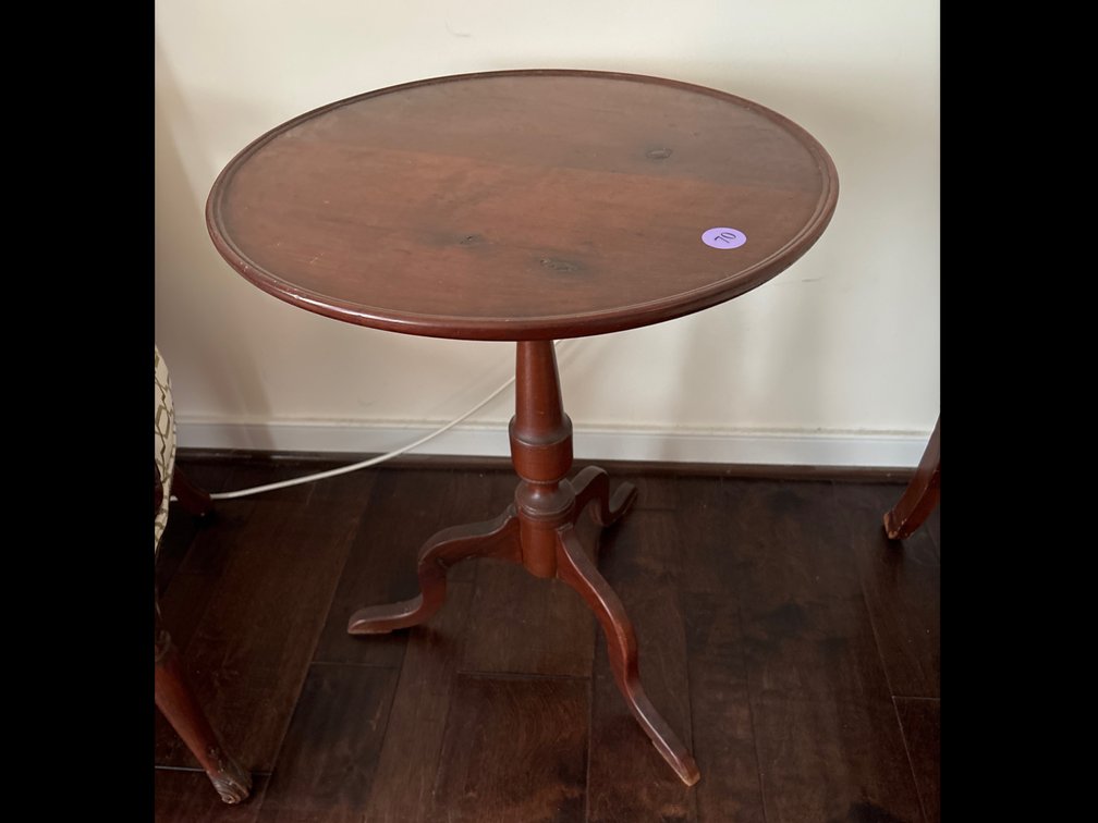 Round tilt-top table; 21” in diameter, 26” tall