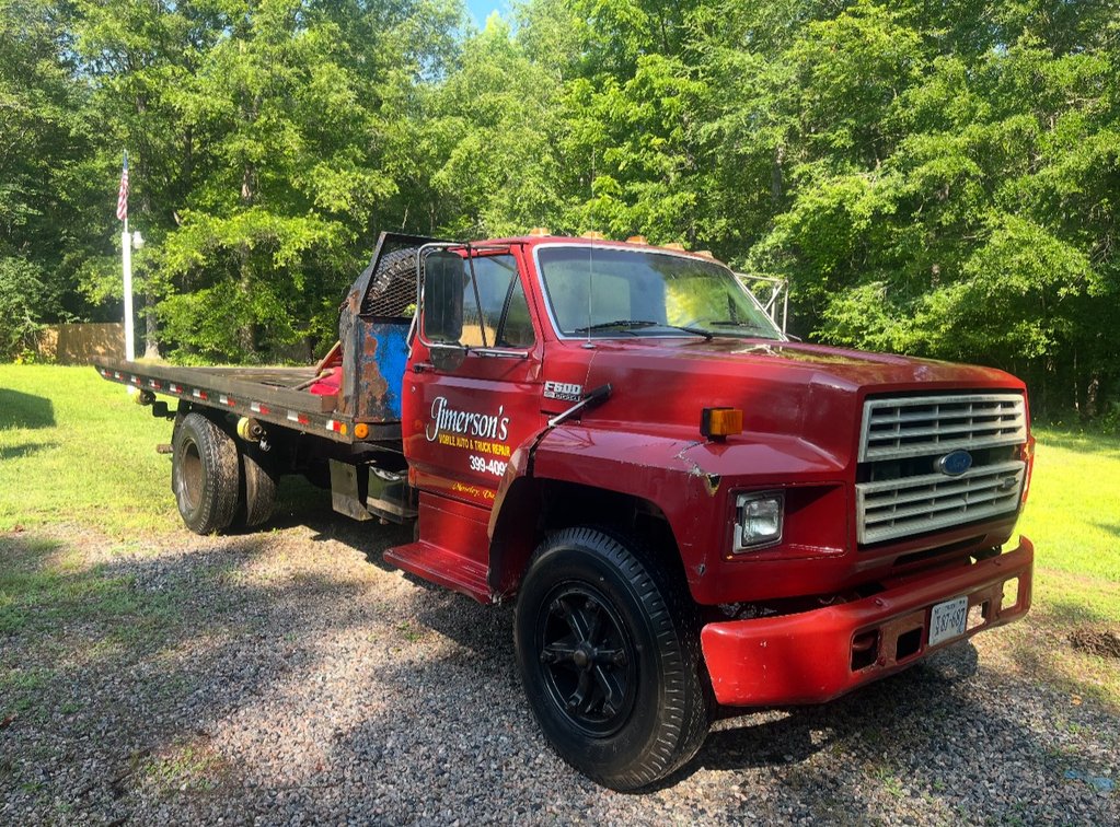 1987 Ford F650 flatbed tow truck